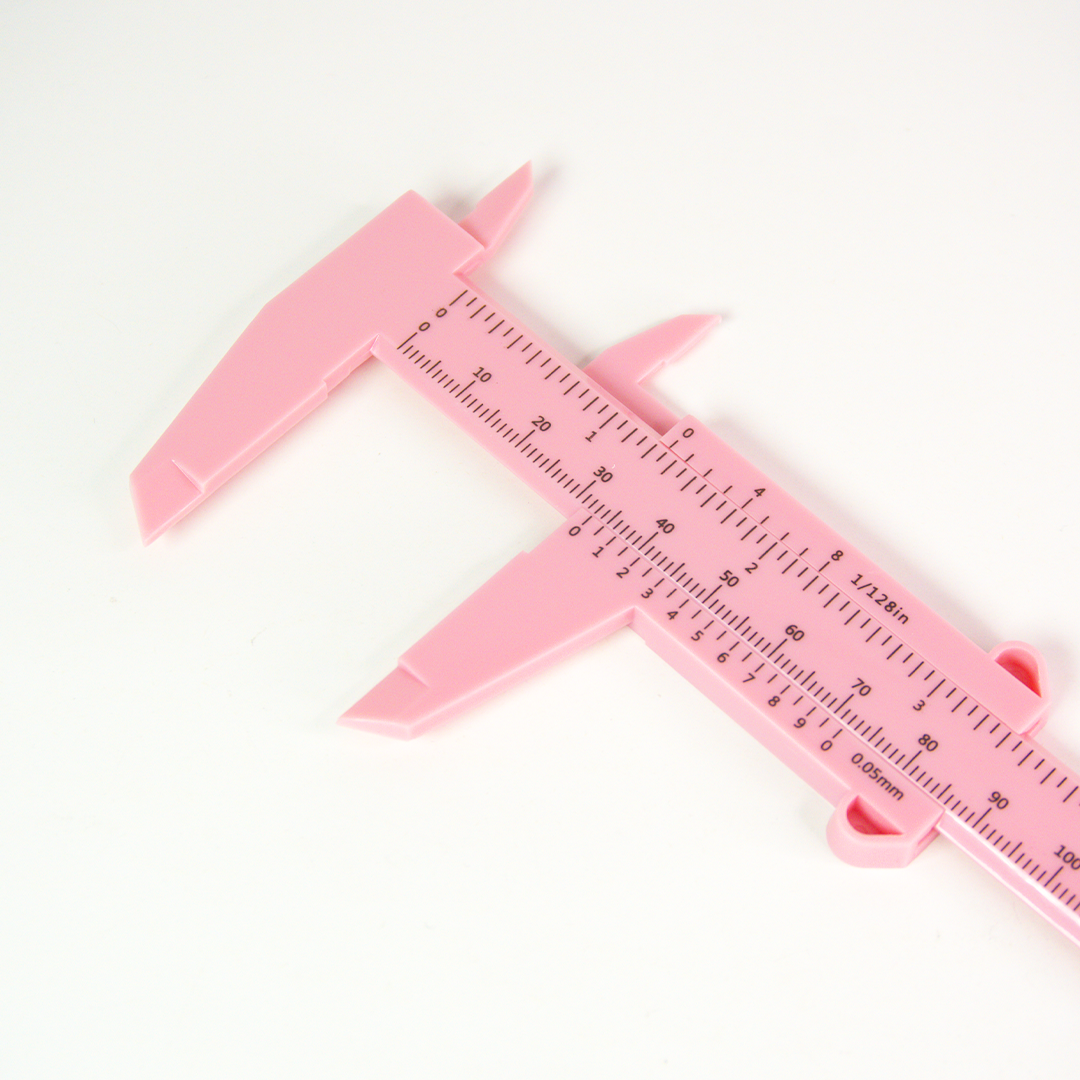 Paquímetro em plástico Rosa