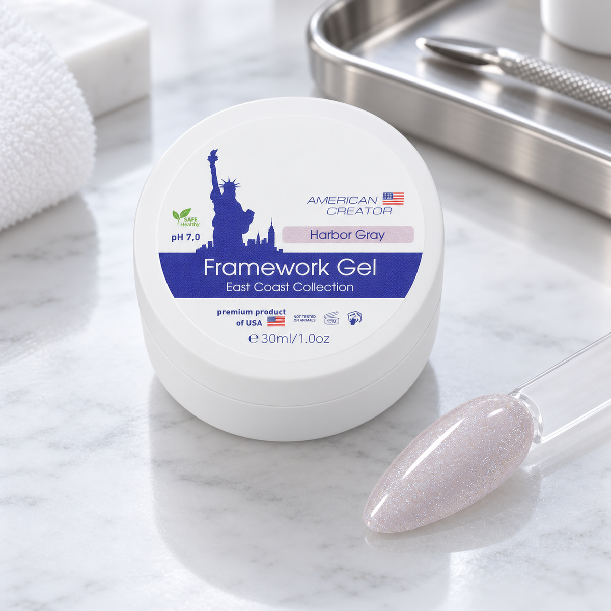 American Creator Framework Gel Harbor Gray 30 ml com amostra da cor em ambiente profissional de manicure
