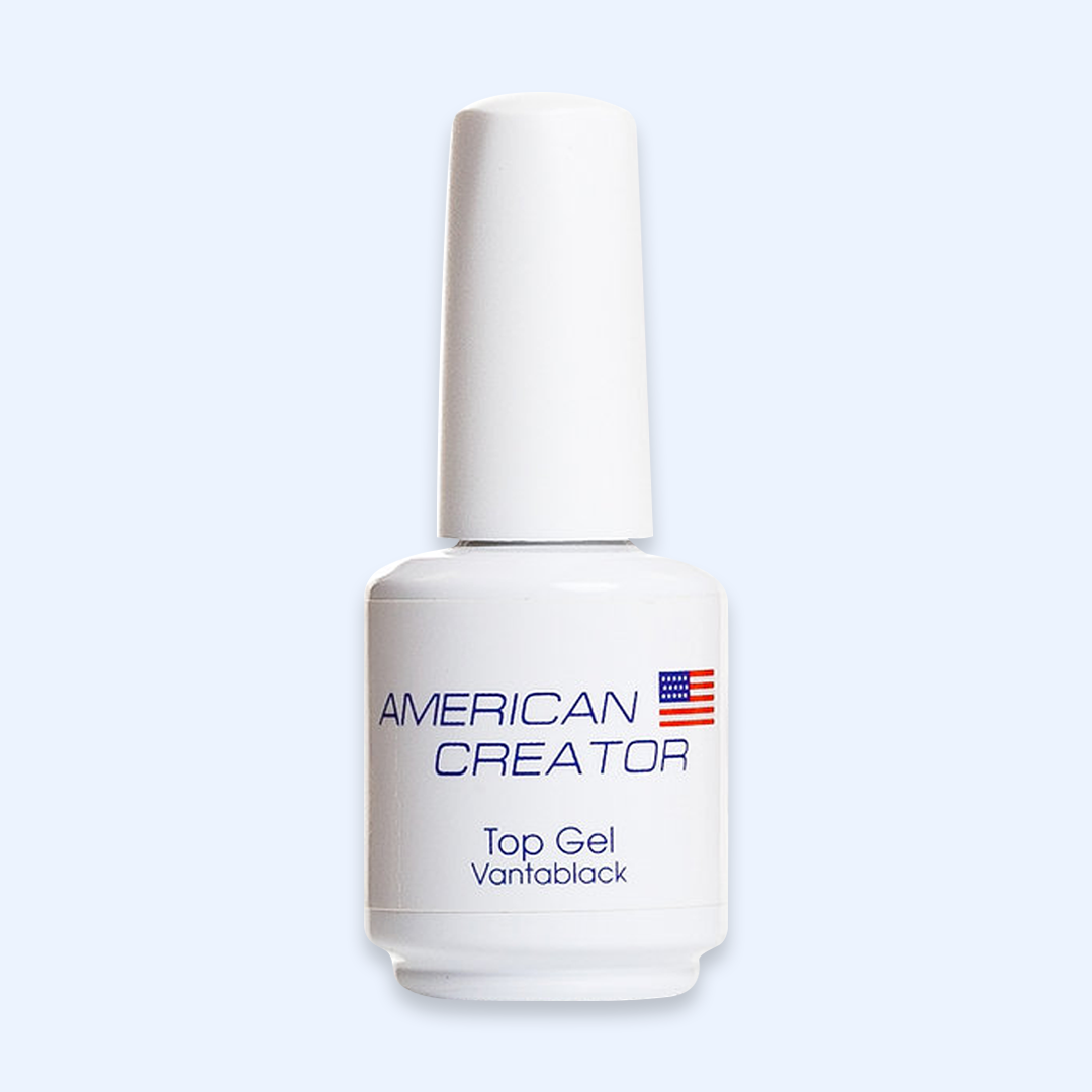 American Creator Top Gel Vantablack em frasco branco sobre fundo azul-claro