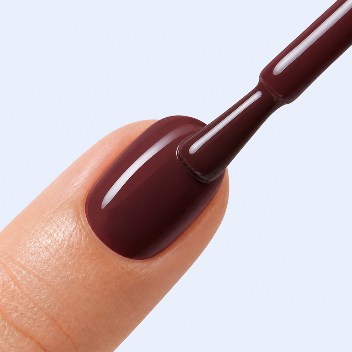 Aplicação do Color Gel Rapture American Creator em unha castanho vinho profundo