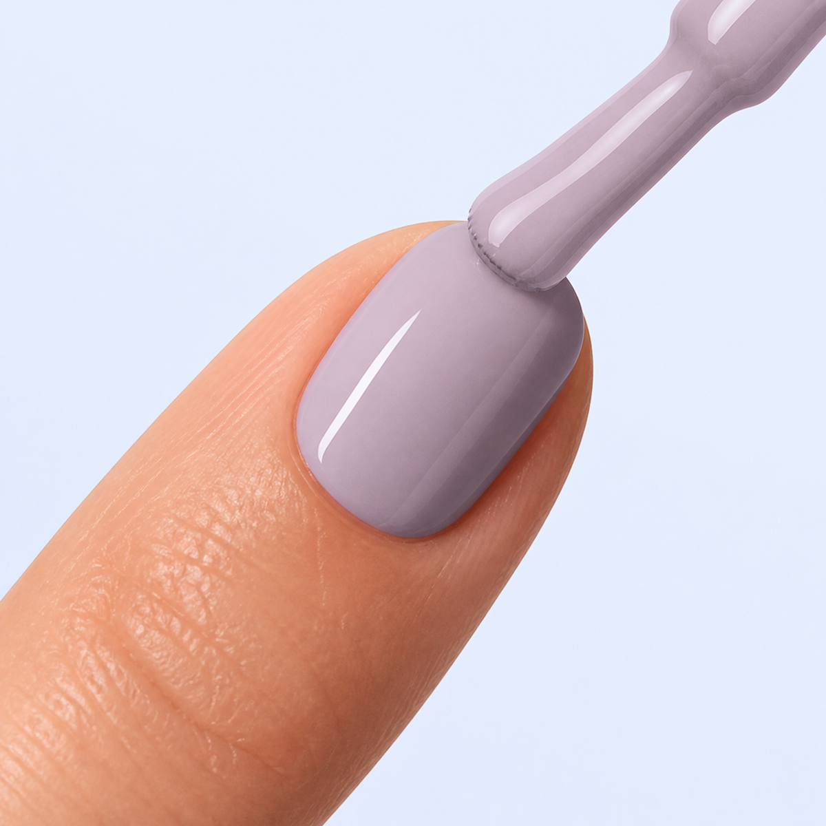 Aplicação do Color Gel Roar American Creator em unha lilas acinzentado