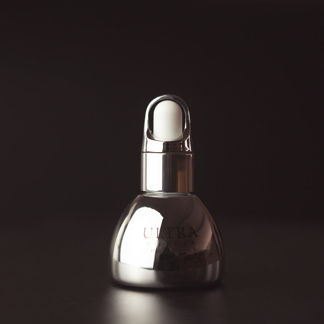 Dlux Ultra Bonder — frasco em ambiente profissional escuro
