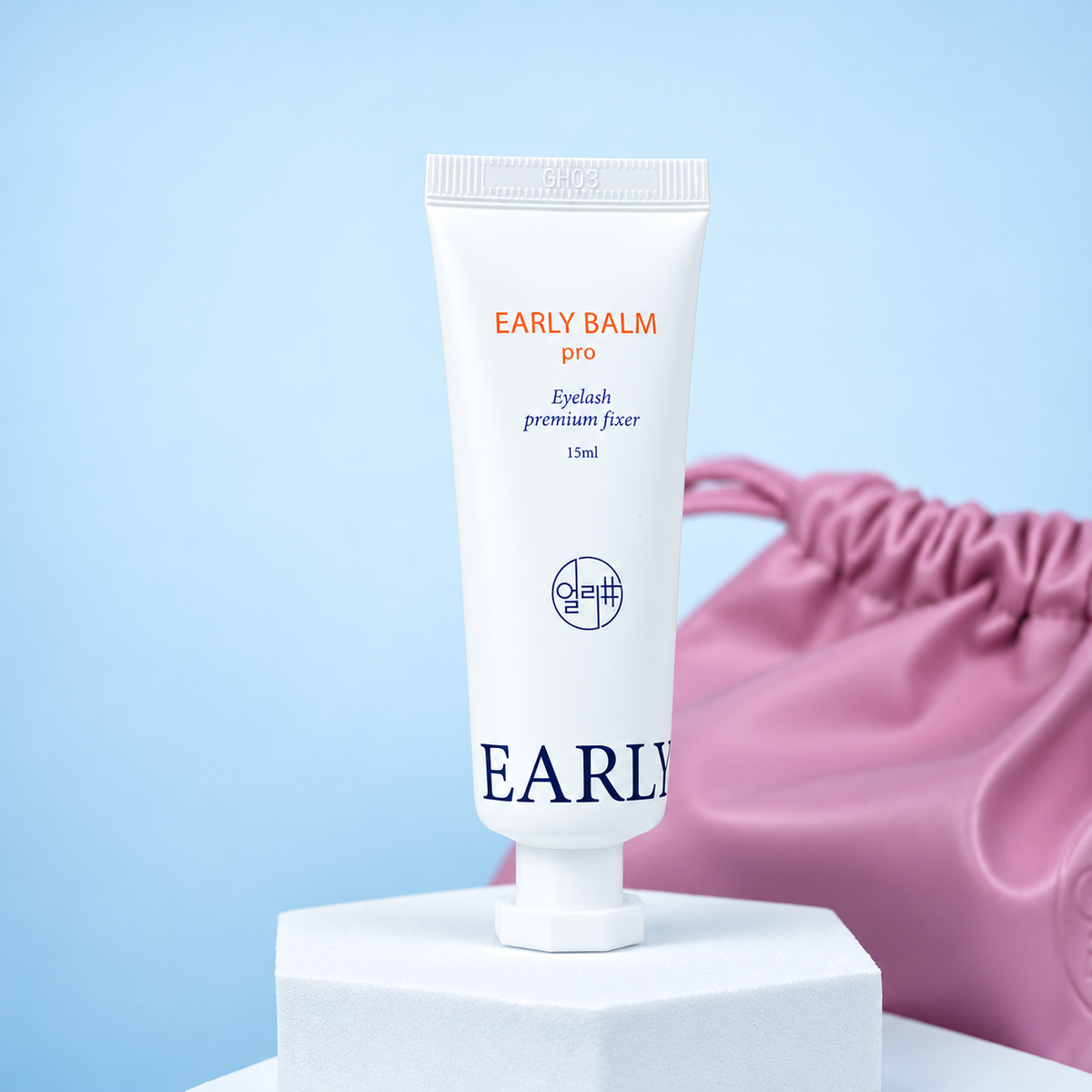 Early Balm Pro de 15 ml apresentado com a bolsa rosa Early numa imagem melhorada
