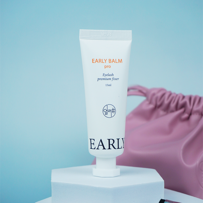 Early Balm Pro de 15 ml apresentado com a bolsa rosa Early