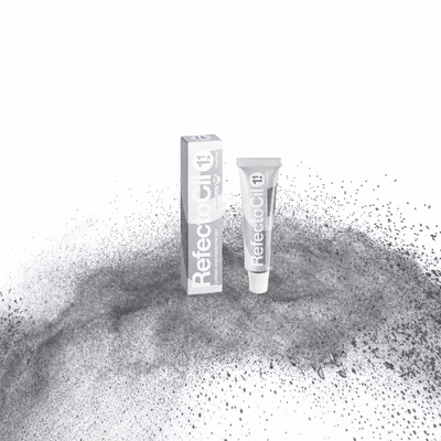 RefectoCil Tinta Nº 1,1 Graphite — tubo e caixa apresentados sobre pigmento grafite numa composição quadrada baseada na fotografia oficial; SKU PROD.2